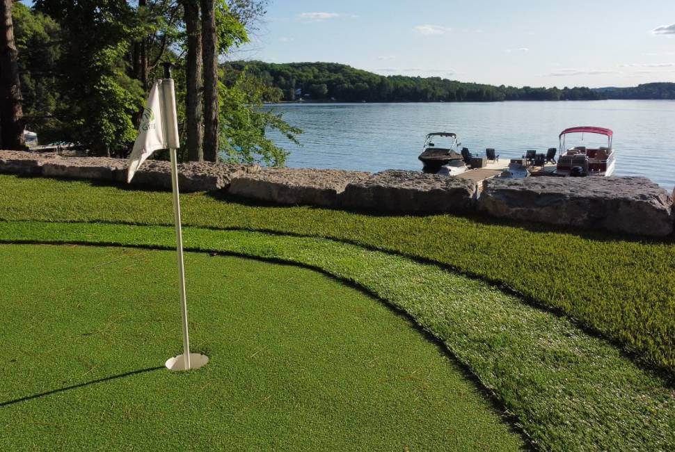 Backyard Putting Green overlooking residential lake