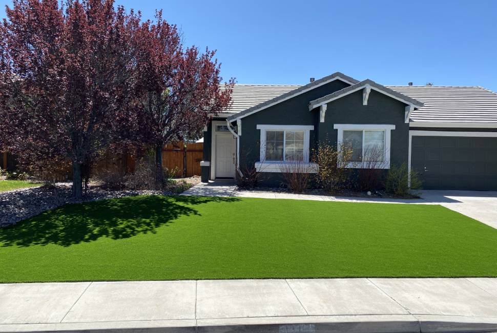 Residential front lawn with artificial grass