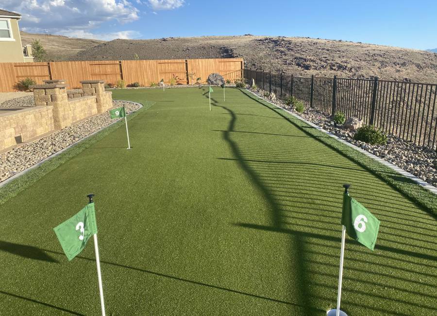 Backyard putting green with numbered flags from Nevada Artificial Grass